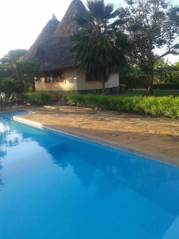 Malaika Holiday Villas Diani Beach Exterior photo